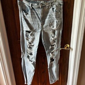 american eagle extremely distressed light blue skinny jeans